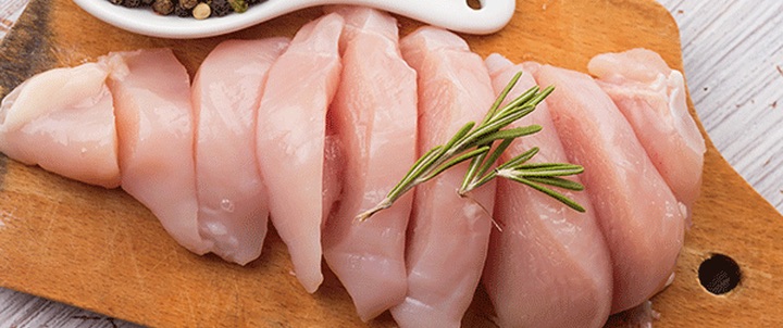 Chicken Sliced on a Cutting Board